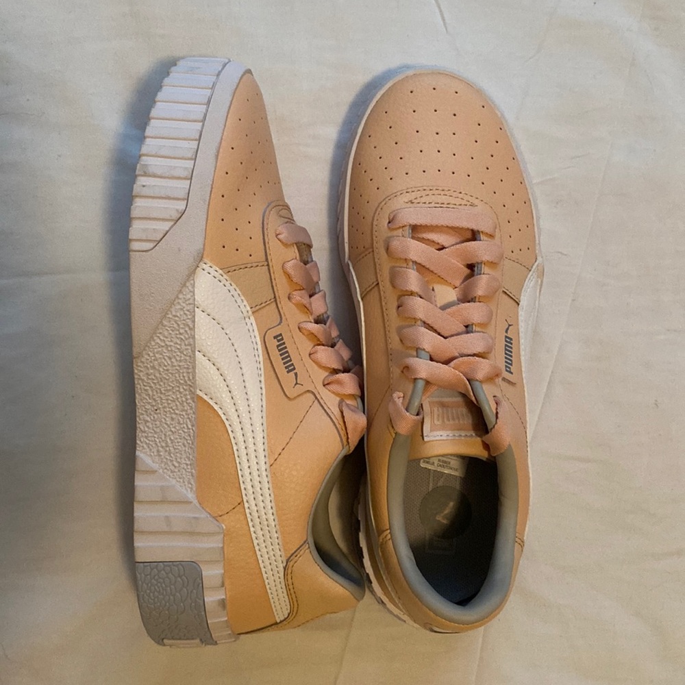 Puma pink, white, and grey shoes. Never worn. Size 7.